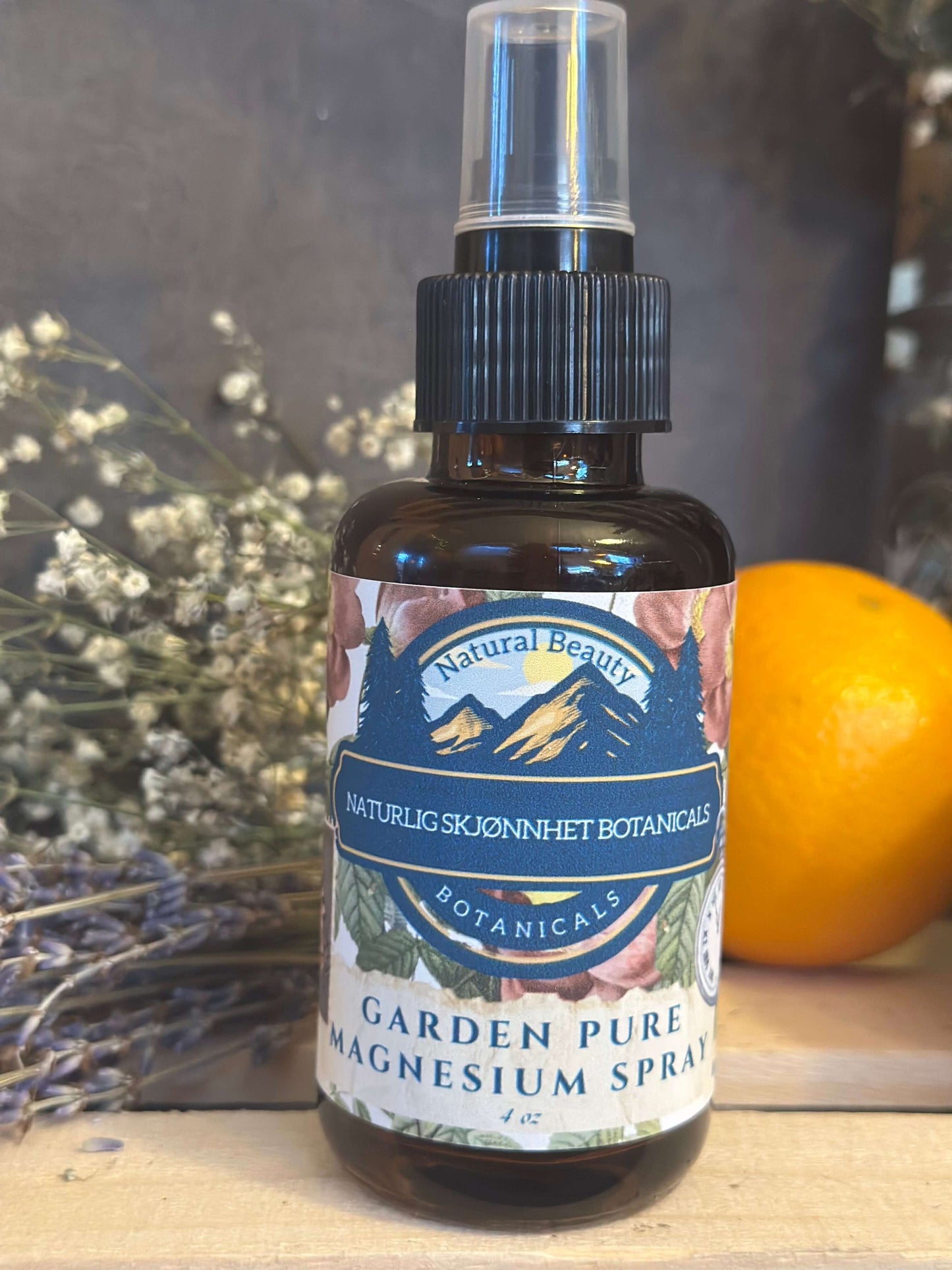 Amber glass bottle of magnesium spray with unique label and spray top