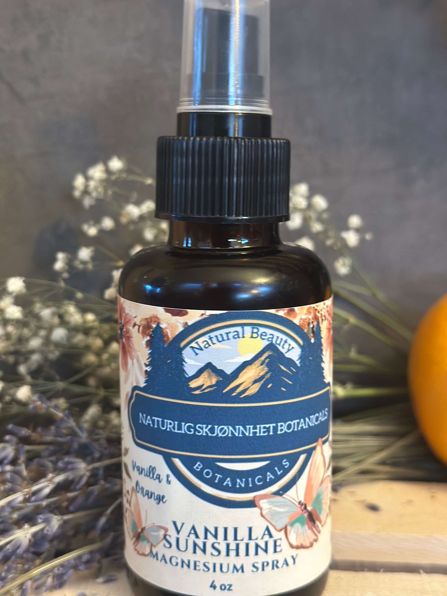 Amber glass bottle of magnesium spray with unique label and spray top