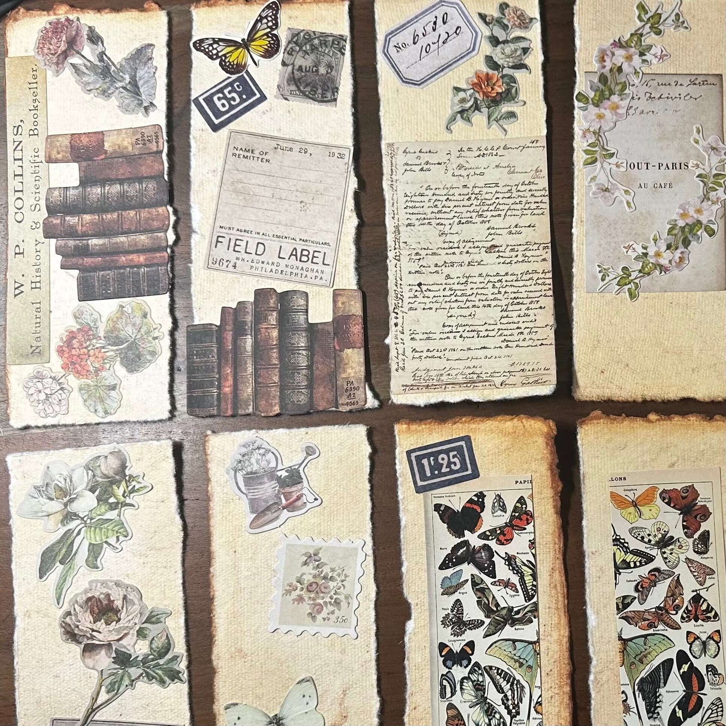 Handmade botanical bookmarks with pressed flower designs and vintage-style artwork on cotton paper.